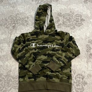 A small champions sweater